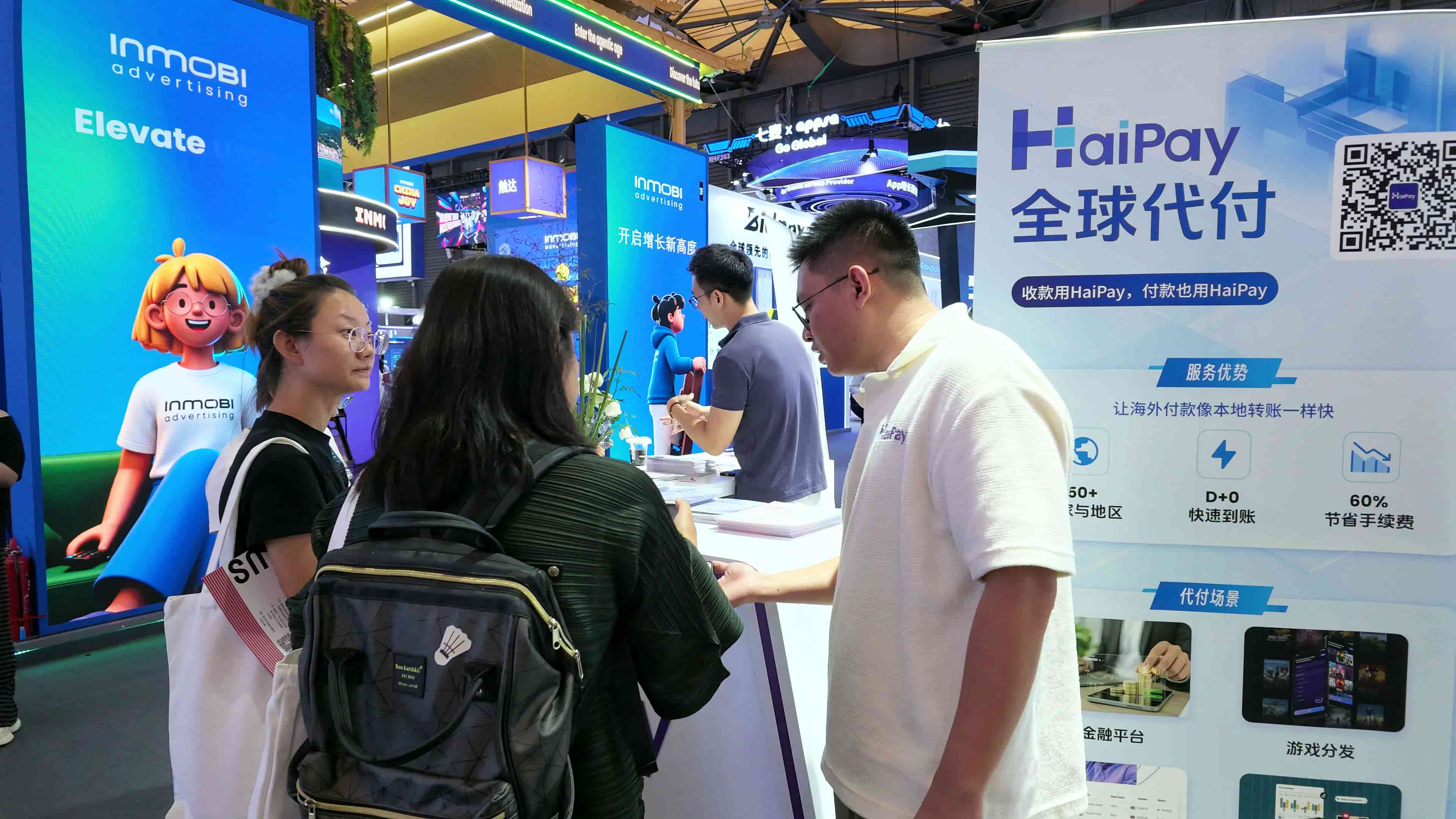 HaiPay team discussing global payout solutions with visitors at ChinaJoy 2026