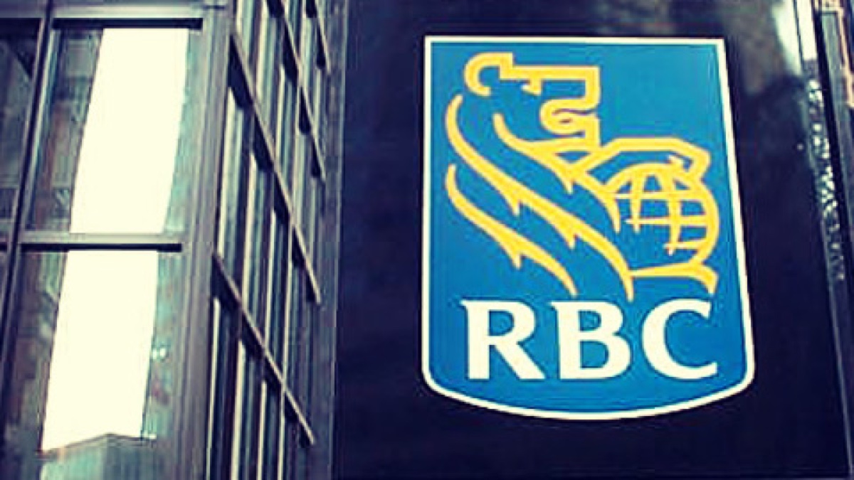 RBC logo displayed on the exterior of a bank building, illustrating the agreed sale of jointly owned Canadian payments provider Moneris.