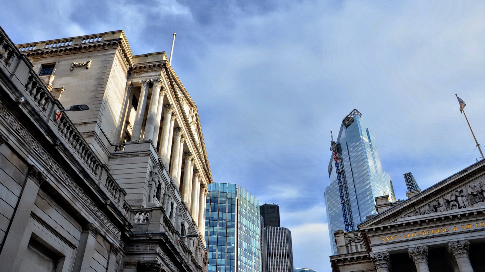The Herbert Baker entrance facade of the Bank of England on Threadneedle Street, with the Royal Exchange portico at right.