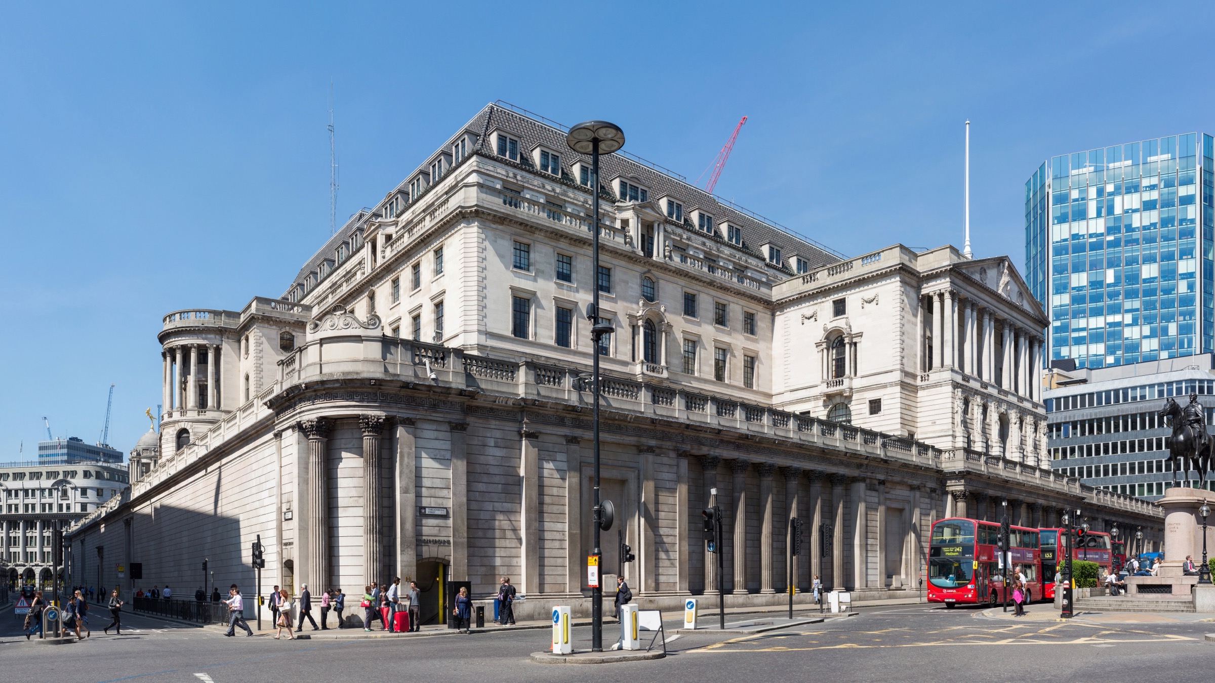 The Bank of England building on Threadneedle Street in the City of London, seen from street level on a clear day.