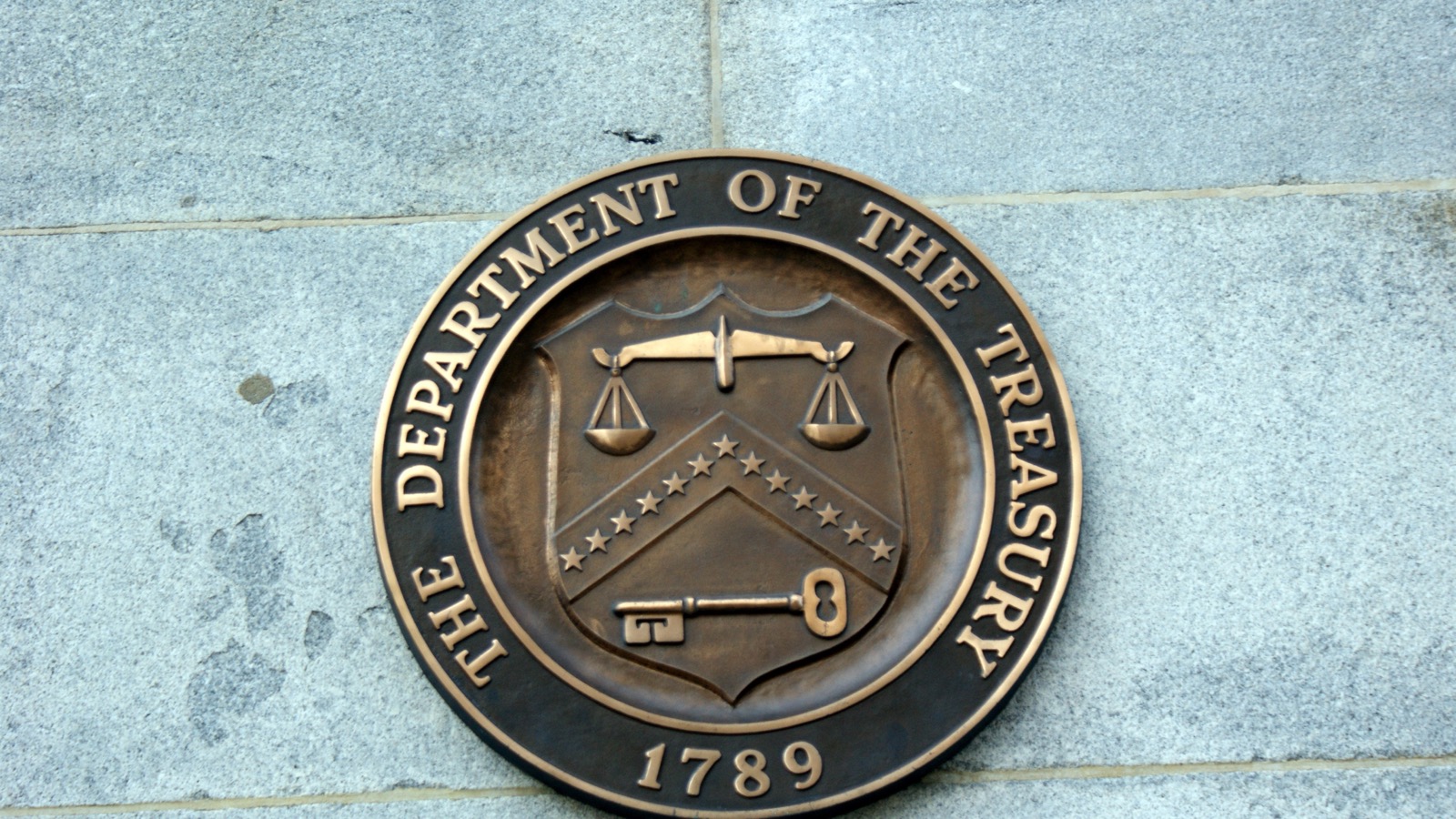The bronze seal of the United States Department of the Treasury, the department in which the Office of Foreign Assets Control sits.