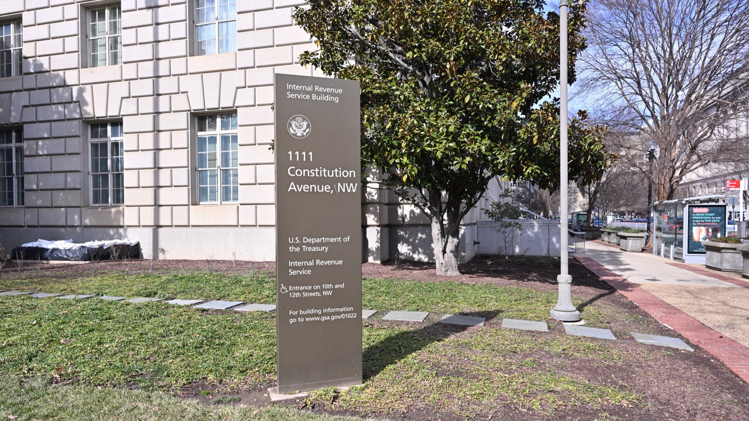 A sign outside the Internal Revenue Service building at 1111 Constitution Avenue NW in Washington, DC, in front of the building’s stone facade
